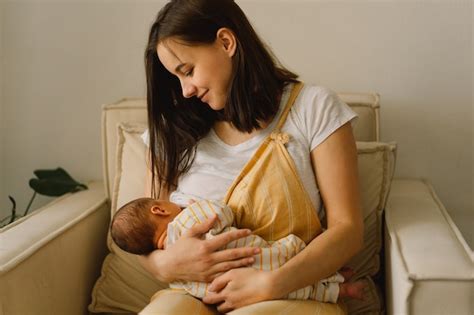 Premium Photo Newborn Baby Boy Sucking Milk From Mothers Breast