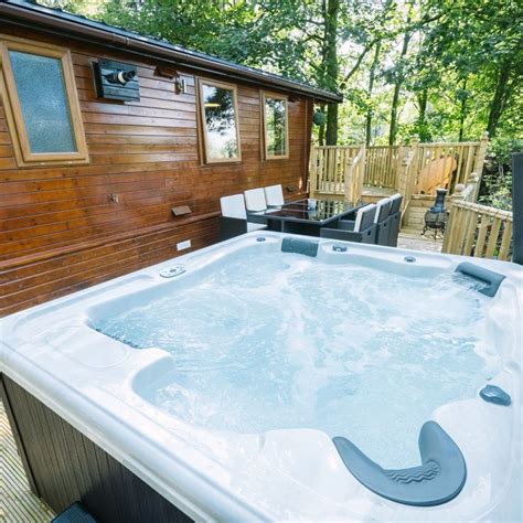 Situated in the picturesque eden valley, in the quaint village of ravenstonedale, cumbrian lake district, you will discover our solid log cabins perfectly located for the lake district national park and set in a stunning fell side location within the yorkshire dales national park. Pin by Lakeland Hot Tub Lodges on Angle Tarn Lodge ...