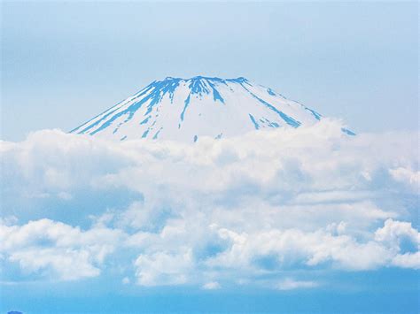 Mt Fuji Rises Above The Clouds Photograph By Dave Hansche Fine Art