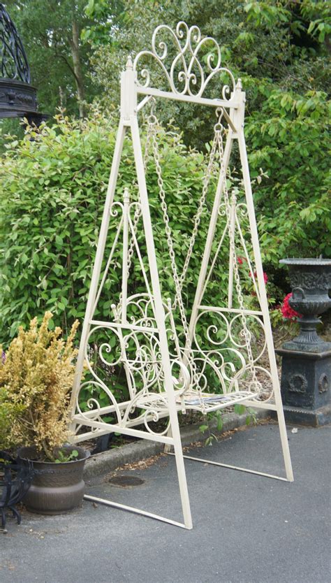 The donovan gate is a center divide gate adding a more ornamental iron gate to. Garden Swings: The Enchanting Element in Your Backyard
