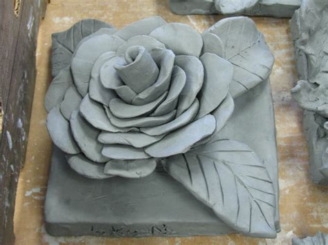 4th grade ceramic flower sculpture greenware; art teacher ... Dampen fingertips in a clean bowl of water when working to keep the clay moist.