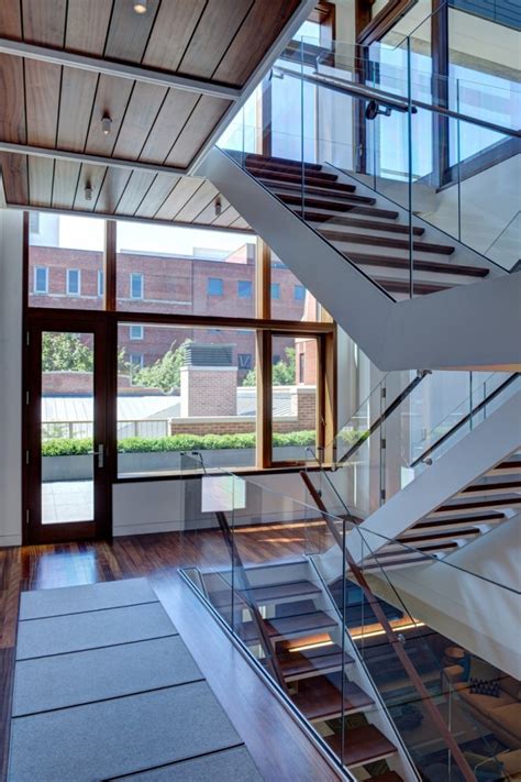 20 Glass Staircase Wall Designs With A Graceful Impact On The Overall