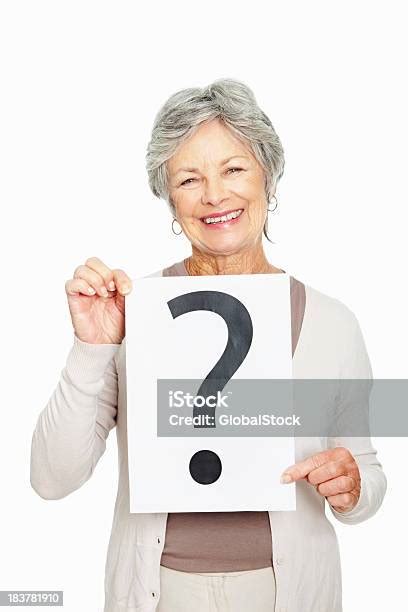 Senior Woman Holding Question Mark Stock Photo Download Image Now