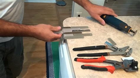 You can cut glass tiles to size using a manually operated rubi cutter. The easiest way to cut glass stainless backsplash - YouTube