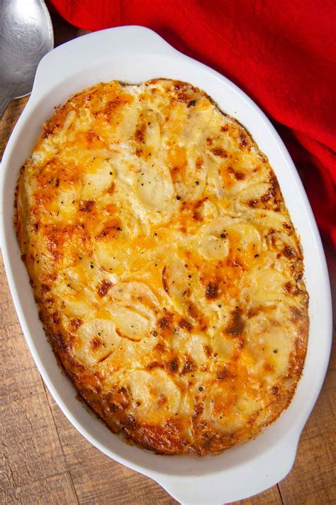 I did layer with onions (cut in rings) sauteed in butter, salt and cooked ham. Easy Cheesy Garlic Scalloped Potatoes Recipe - Dinner ...