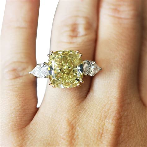 Yellow diamond engagement rings are unique and special. Platinum 10ct Fancy Yellow Cushion Cut Diamond Engagement Ring