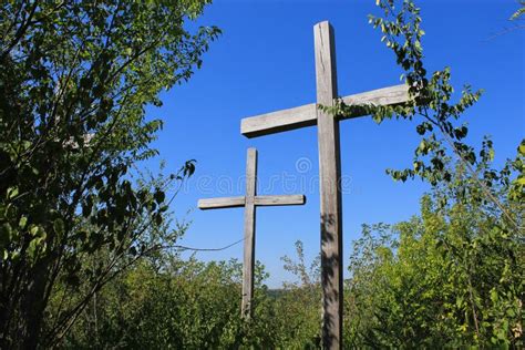 Silhouettes Of Old Wooden Crosses In Contrasting Sunlight Religious