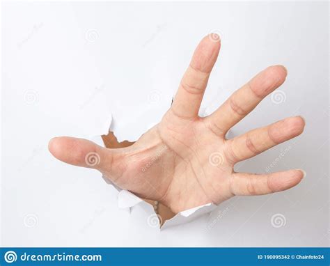 Male Hand Punching Through The Paper Stock Photo Image Of Power Grab