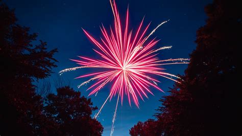 Download Wallpaper 1366x768 Fireworks Salute Sparks Lake Night