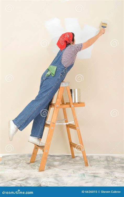 Woman On Ladder Painting Royalty Free Stock Photo Image