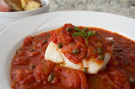 Though tomato sauce is made with ripe tomatoes, it is also made with a large amount of salt. Poached Cod in Tomato Caper Sauce | Recipe in 2020 ...