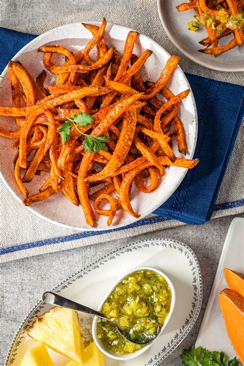 Crispy sweet potato fries are perfectly crispy and fluffy in the middle with both fried and baked directions with a baked sweet potato fries recipe: Air Fryer Sweet Potato Fries Recipe with Spicy Pineapple Dipping Sauce