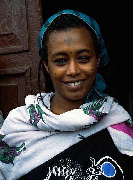 Woman In Traditional Dress With Symbols On Her Face Dessie Ethiopia