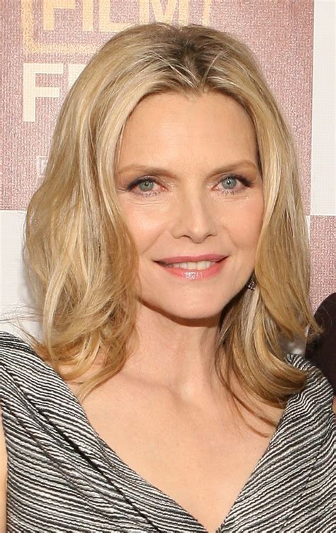 Short bob haircut with soft, dark fringes on front is low fuss and comfortable. Pin on angle bangs