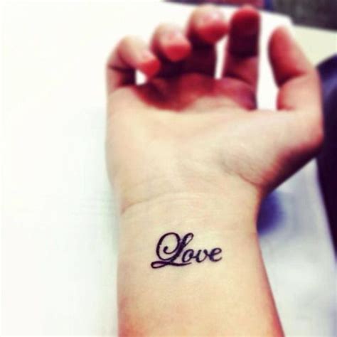 Little Wrist Tattoo Saying Love Love Wrist Tattoo Small Tattoos