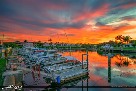 Cape canaveral rocket launches can be seen from the balcony, street or beach. Boats at North Palm Beach Marina Sunset with Red Colors