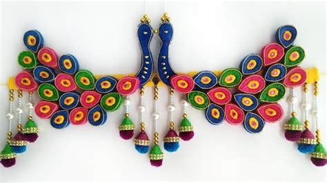 Hand made home decor, hyderabad, india. DIY Peacock Door Toran Craft Idea - ArtsyCraftsyDad
