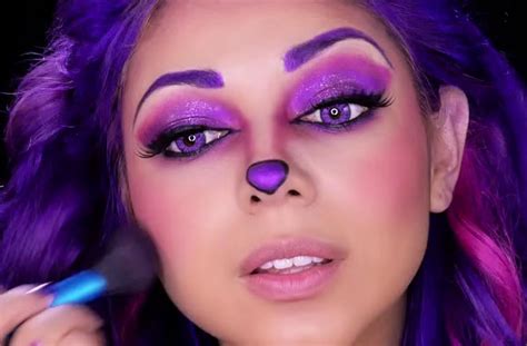 How To Perfect The Cheshire Cats Purple Makeup Look For Halloween
