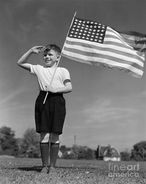 Boy Holding American Flag And Saluting Photograph By H Armstrong Roberts