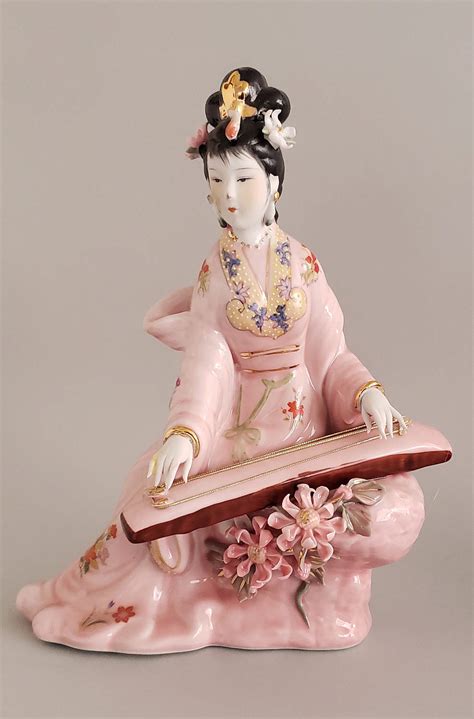 Chinese Geisha Girl Figurines Four Chinese Porcelain Geisha Figurines