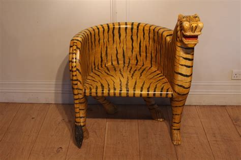soldpair  tiger stylized wooden tub chairs antique