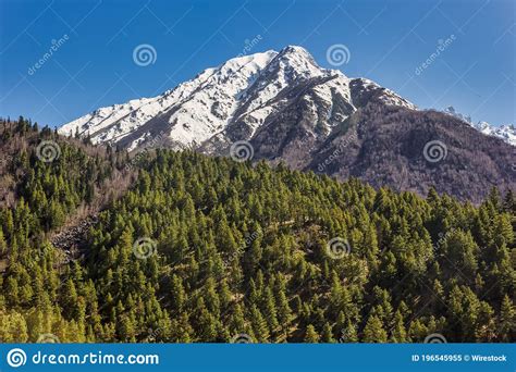 Landscape Of Snow Covered Himalayan Mountains Near The Village Of