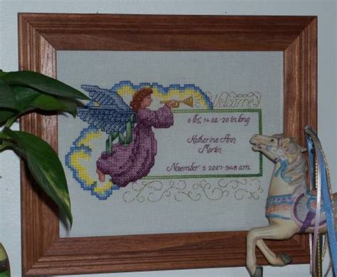 This is a children's craft website and with that in mind the patterns and directions are geared to those learning to pattern: Angel Welcome Birth Record