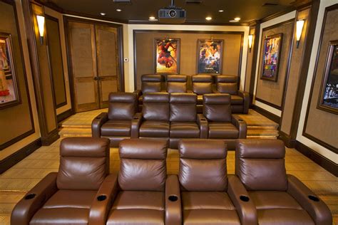 Very Elegant and Contemporary custom Home Theater room featuring 3 Rows