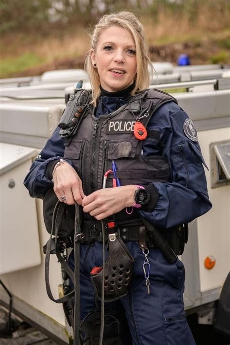 Woman Police Officer In Uniform