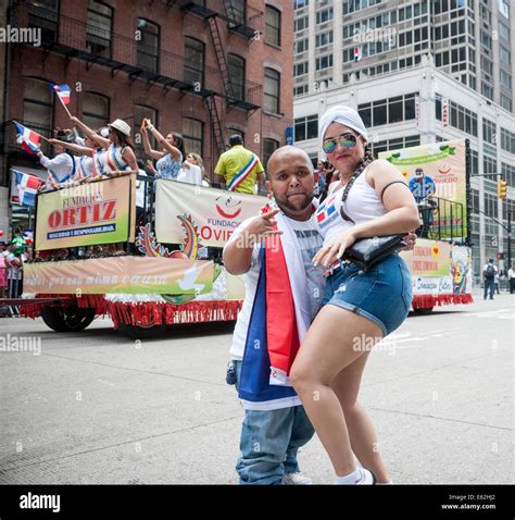 dominican americans marchers pose mid march the 33rd annual dominican day parade in new york