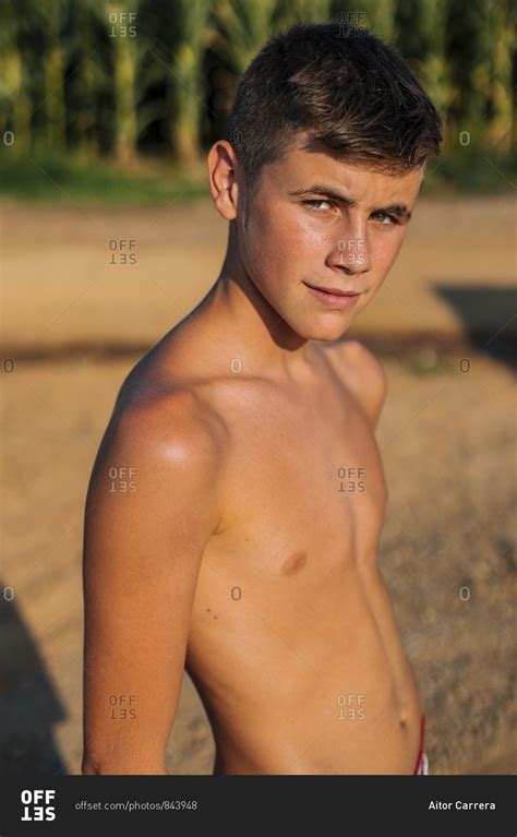 Portrait Of A Shirtless Boy In A Field In Summer Stock Photo Offset