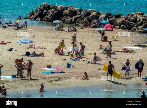Marseille France People Relaxing On Beach Scenes On Mediterranean