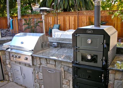 Can you have a grill in an outdoor kitchen? Outdoor Pizza Ovens & Smokers — Unlimited Outdoor Kitchens