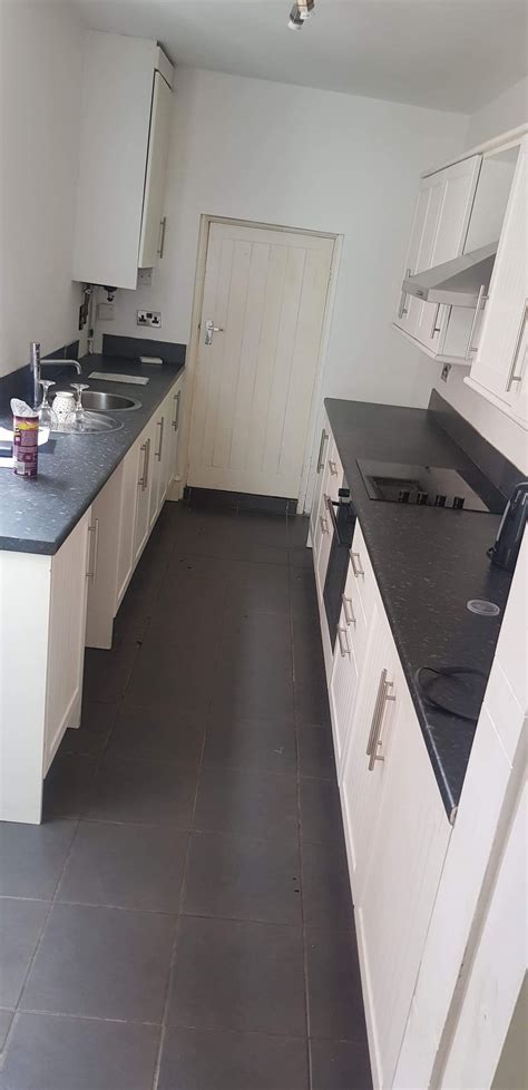 Woman Quoted £1000 For New Kitchen Floor Revamps It Herself For £100