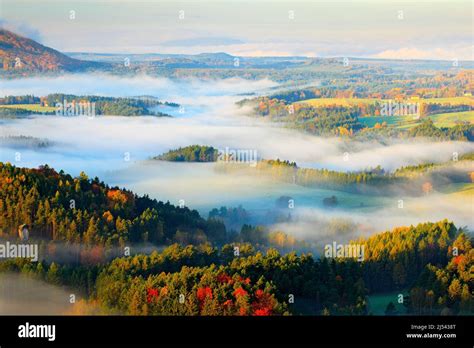 Czech Typical Autumn Landscape Hills And Villages With Foggy Morning