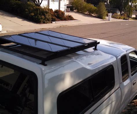 You better consult an expert, to avoid damaging your roof, or having your panels. Installing a DIY Roof Rack for Solar Panels : 4 Steps (with Pictures) - Instructables