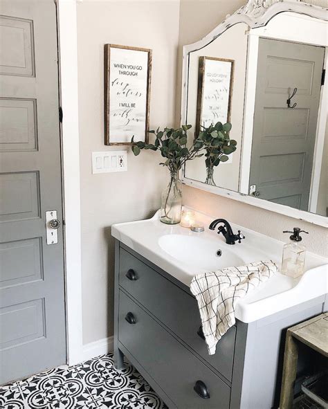 Looking for bathroom décor inspiration? Farmhouse bathroom with white neutral colors, chippy paint ...