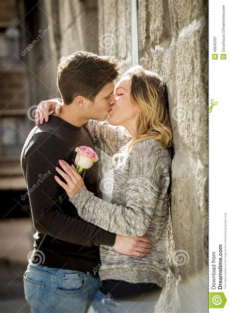 Beautiful Couple In Love Kissing On Street Alley