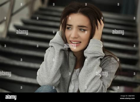 Depressed Young Woman Indoors Stock Photo Alamy