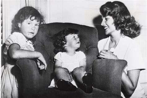 Rita Hayworth With Her Two Daughters Rebecca And Yasmin Pose For Photos At A Press Conference