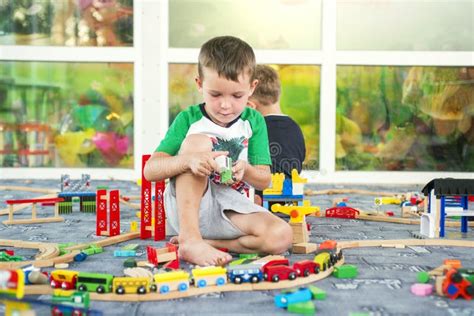 Children Playing With Wooden Train Toddler Boy Play With Train And