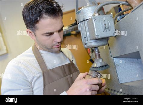 Shoemaker At Work Stock Photo Alamy