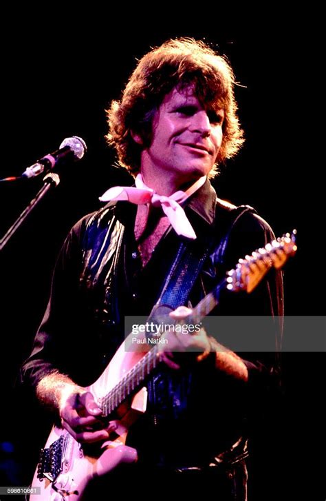 american rock musician john fogerty plays guitar as he performs news photo getty images