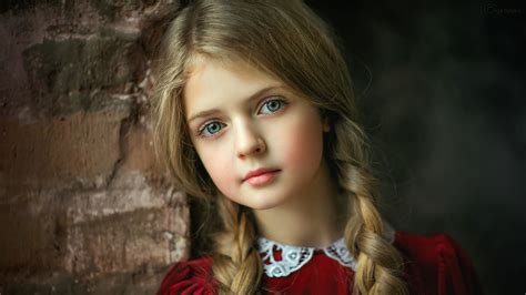 Cute Little Blonde Ash Eyes Girl Is Leaning On Wall Wearing Red Dress Hd Cute Wallpapers Hd