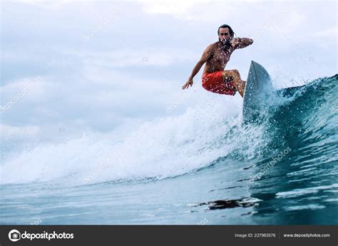 Surfer Riding Waves Bali Picture Water Stock Photo by ©alexzhilkin
