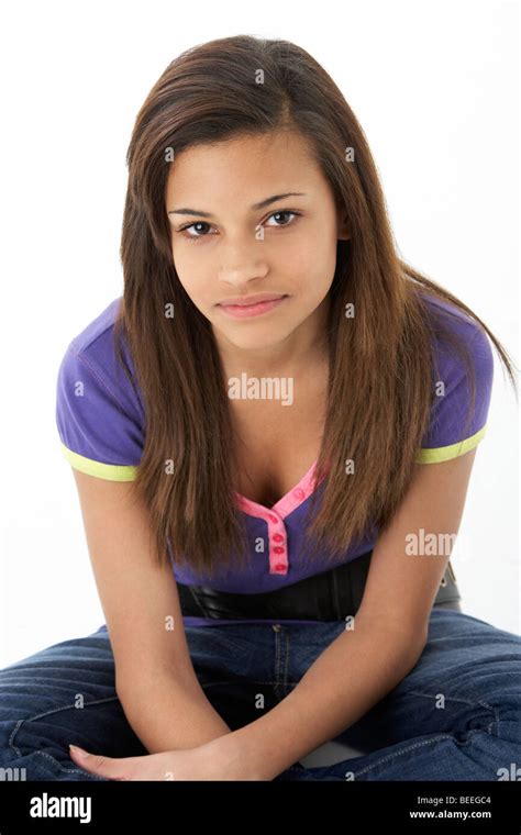 Studio Portrait Of Smiling Teenage Girl Stock Photo Alamy