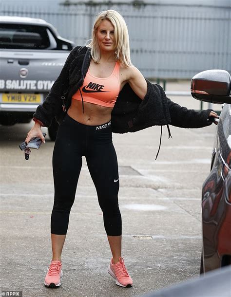Danielle Armstrong Shows Off Her Gym Honed Physique In Orange Sports Bra Daily Mail Online