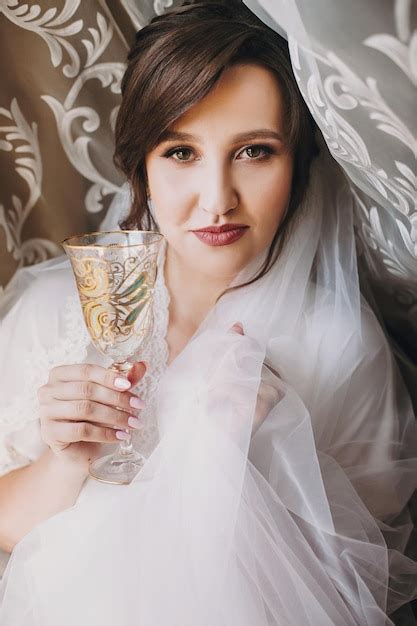 Premium Photo Beautiful Stylish Brunette Bride Posing In Silk Robe