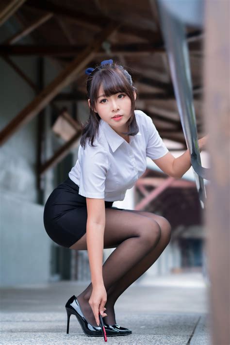 Asian Pose Pantyhose Legs Stilettos Shorts Blouse Brunette Girl