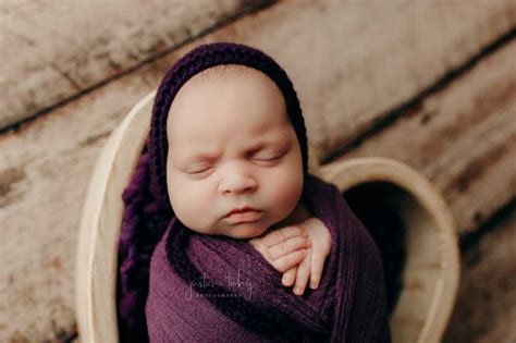 Grumpy Faced Baby Poses For Hilarious Newborn Photo Shoot